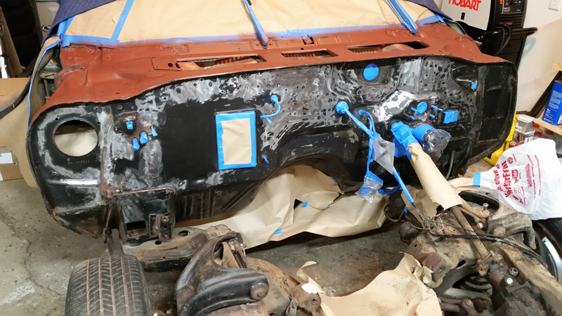 Half-assed “don’t fog the freshly painted floor pans with red primer” masking is half-assed